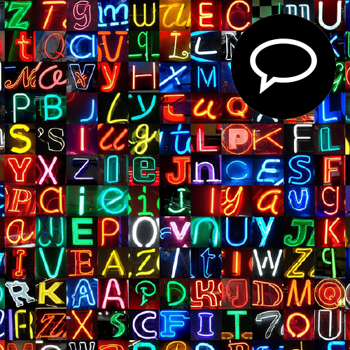 Lettres colorées sur fond noir.